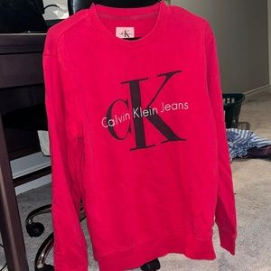 Red Calvin Klein crew neck with CK decal